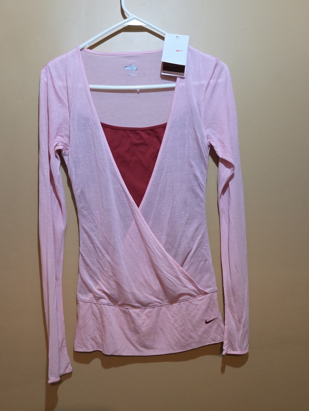 Nike Women's FitDry Light Pink Wrap-Front Long Sleeve Top with Rose Inset